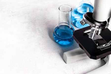 Research in medical laboratory with microscope equipment, close up