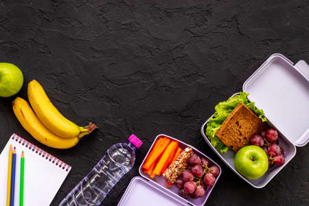School lunch boxes filled with fruits and vegetables. Healthy mealの写真素材