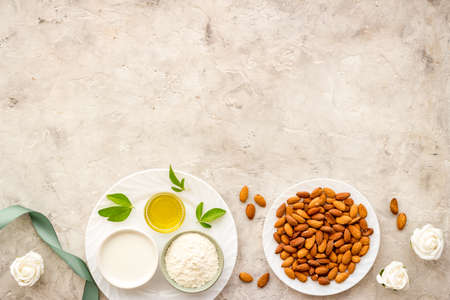 Almond products - oil milk flour with nuts. Organic food and cosmetic backgroundの写真素材