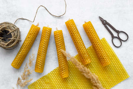Eco home decor product. Handmade beeswax honey aroma candles. DIY concept
