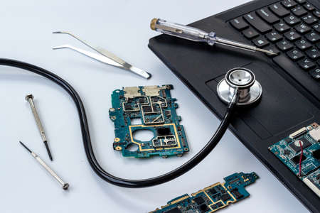 Production or repair pc system - computer with circuit board and toolsの写真素材