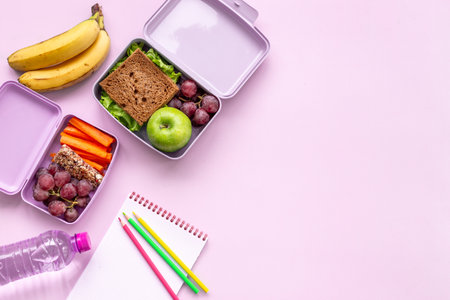 School lunch boxes filled with fruits and vegetables. Healthy mealの写真素材
