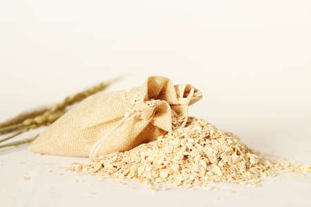 Small linen bags and cerealの写真素材