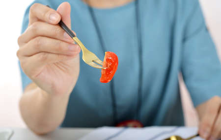 Feed tomatoesの写真素材