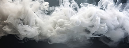 Cloud of white smoke on a black background. Copy space. Banner.の素材