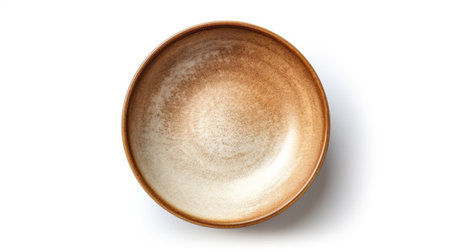 Empty brown ceramic bowl isolated on white background, clipping path included.の素材