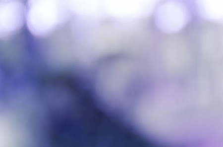 Blue bokeh out of focus background from nature forestの写真素材