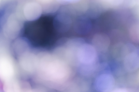 Blue bokeh out of focus background from nature forestの写真素材