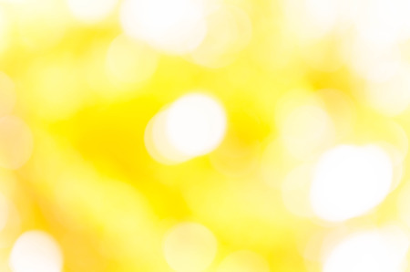 yellow bokeh background from nature under tree shadeの写真素材