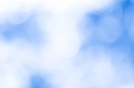 Bokeh in a blue natural background, defocusedの写真素材