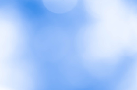 Bokeh in a blue natural background, defocusedの写真素材