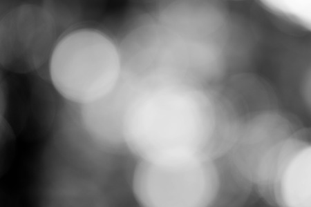 Black bokeh backgroundの写真素材