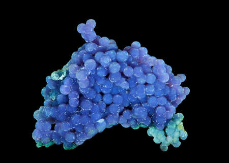 Natural stone-chalcedony Spherulites (grape chalcedony) on a black background. Natural mineral gemstone. Closeup.の写真素材