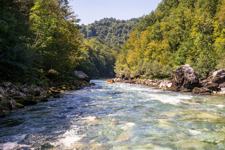 rafting boat on the fast mountain river Tara in Montenegroの写真素材