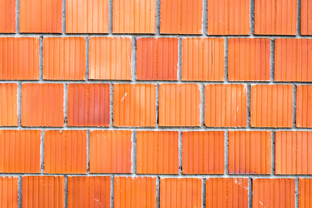 big red brick wall backgroundの写真素材