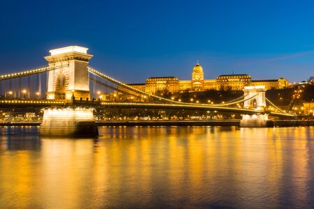 Chain bridge over Danube river at sunset in Budapest, Hungaryの写真素材