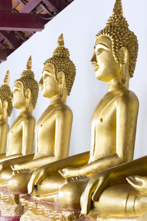 Row of Buddha statueの写真素材