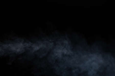 Smoke background. fog on black backgroundの写真素材