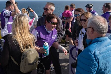 Cystic Fibrosis Fund Raising Cycle Race, May, 12, 2019: Rider surrounded by family and friends at...