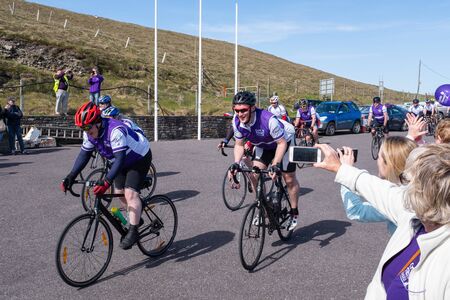 Cystic Fibrosis Fund Raising Cycle Race, May, 12, 2019: Spectators cheer the riders at the finish line of the Cycle 4 CF fund raising ride from Malin to Mizen Head, a total of 602kmsのeditorial素材