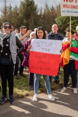 Shannon, Ireland, June. 5, 2019: A lady protesting against the Donald Trump visit with signs at Shannon Airport, Ireland at Shannon Airport, Ireland 5のeditorial素材
