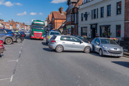 Marlborough, Wiltshire, UK, March, 24, 2019: The handbrake on a car fails causing it to run into another car and blocks the one way system in Marlborough town centre on a busy sunny Sunday afternoonのeditorial素材