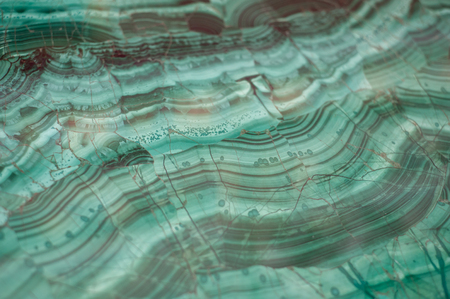 Texture of polished Malachite. Green background. Selective focusの写真素材