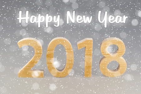 Postcard 2018 Happy New Year. numbers cut from wood on a gray background. Snowflakes in the backgroundの写真素材