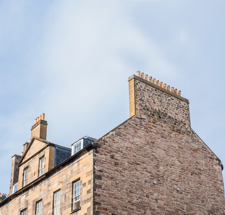 Ancient castle, roof, tower on sky background