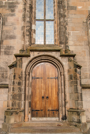 Brown door to an old church in Scotlandの写真素材