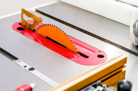 Woodworking, adjustable circular saw in the workshopの写真素材