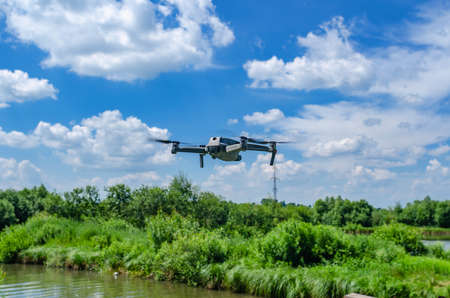 Drone quadcopter shoots video on nature.の写真素材
