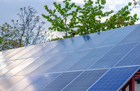 Solar panels on roof of building. solar power. Alternative source of electricity.