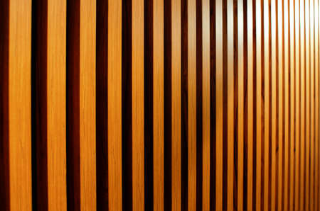 Wooden slats on wall in modern interior. abstract background. wooden wall. side view.の写真素材