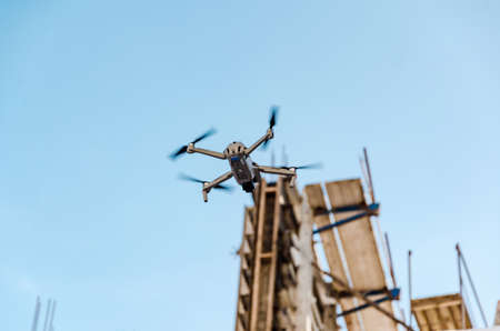 Drone flies in the air in the city. new technologies.の写真素材