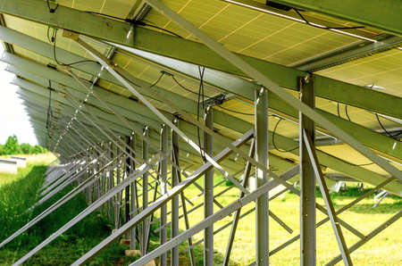 Mounting to solar panels. bottom view. Solar panels on field.