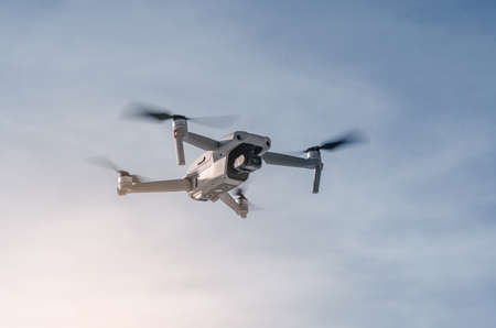 Drone flying in air. close. blue sky background. new technologies.