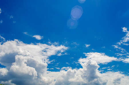 White clouds on background of blue skyの写真素材