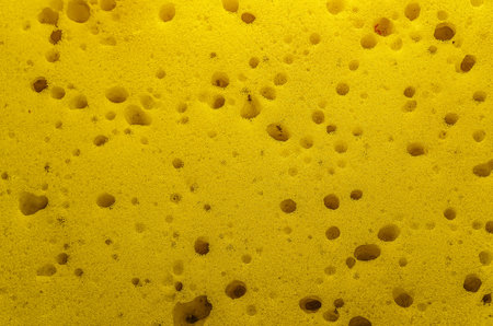 Close-up of paralon yellow color, washcloth.の写真素材