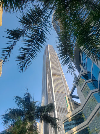 Tall modern skyscraper against blue sky