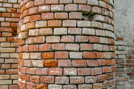 Old red brick column, weathering bricks.の写真素材