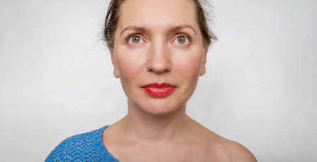 Portrait of a beautiful charming woman over a white background. Portrait Wide Angle Cameraの写真素材