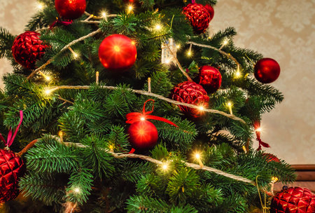 Decorated Christmas tree, sparkling and fairy background. New Year