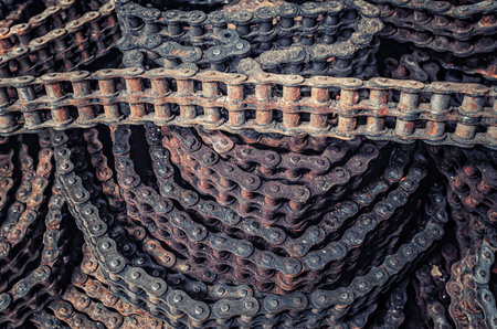 Roller chains background texture. Rusty old metal chains, chain transmission mechanismの写真素材