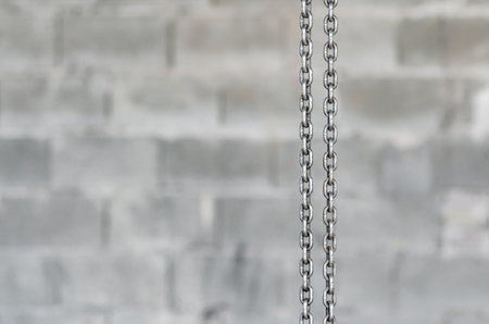 Metal chain on a gray backgroundの写真素材