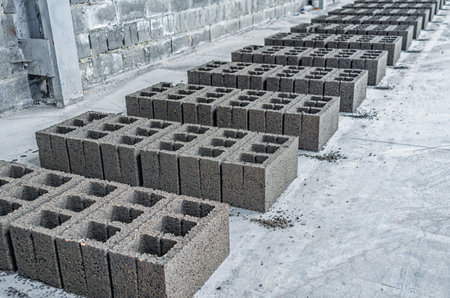 Concrete cinder blocks, building material in form of gray bricks. Use on construction site.の写真素材