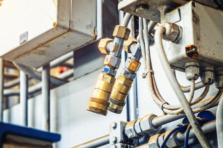 Industrial metal pipes. Fittings, connections for water supply systems, nutsの写真素材