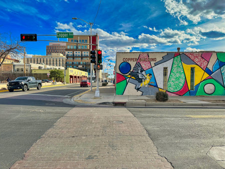 ALBUQUERQUE, NEW MEXICO, USA - March 8, 2023. Red color of traffic light on Copper avenue. Modern street and buildingsのeditorial素材