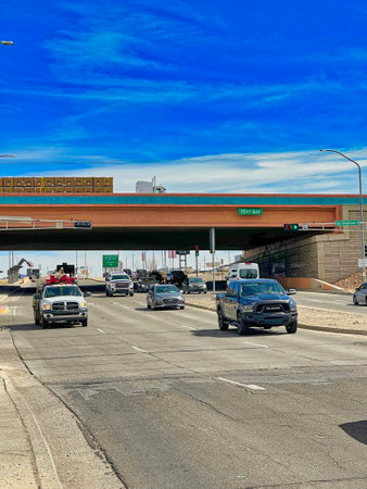 ALBUQUERQUE, NEW MEXICO, USA - March 9, 2023. Asphalt road and highway bridge under blue skyのeditorial素材