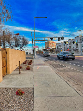 ALBUQUERQUE, NEW MEXICO, USA - March 8, 2023. Modern street and buildings. Traffic lightsのeditorial素材